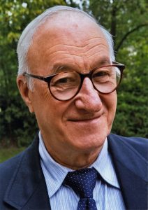 Portrait photo of Albert Bandura, smiling