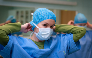 Woman in medical scrubs