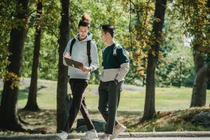 Men walking and talking