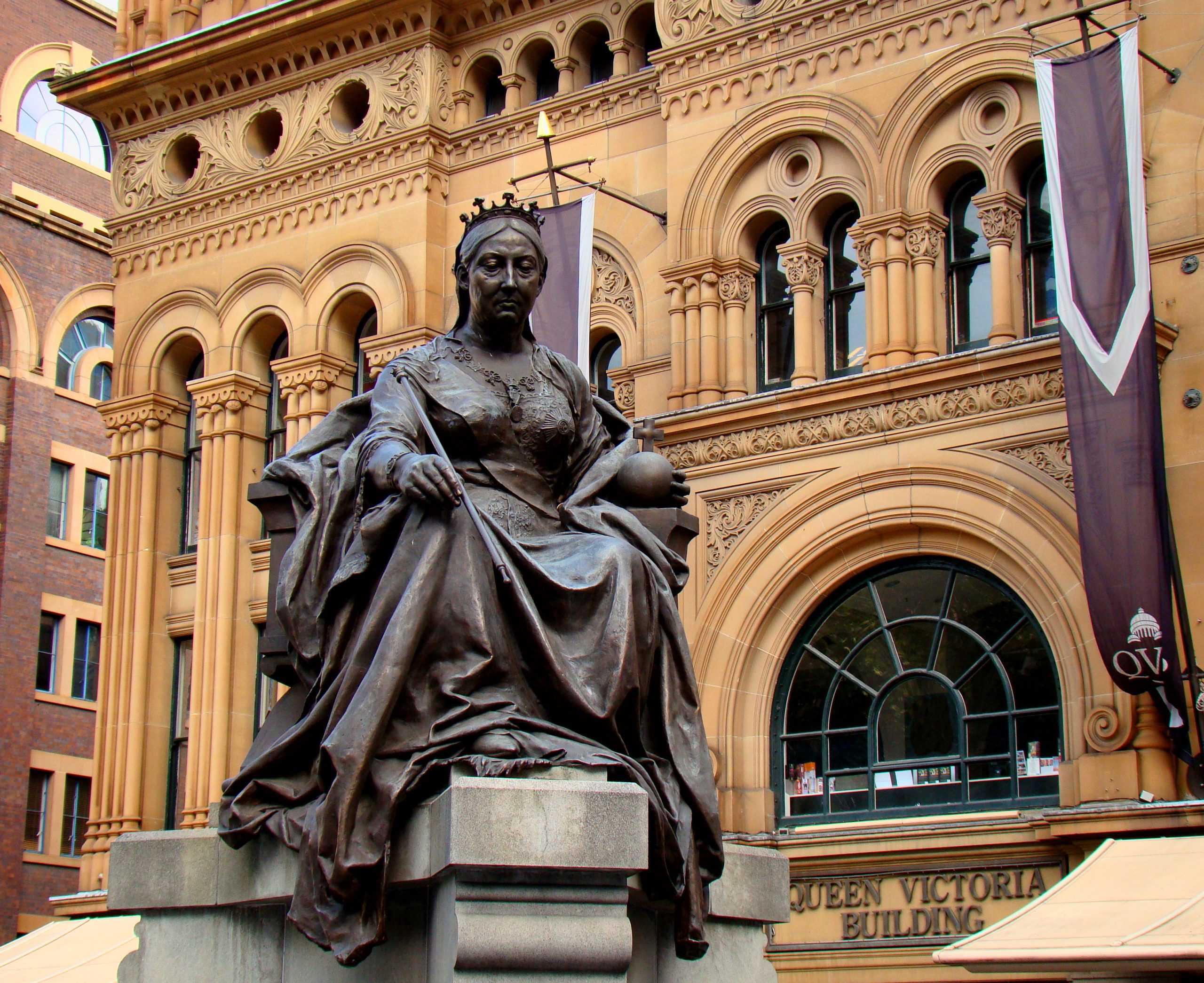 The Queen Victoria statue - large bronze statue of woman sitting on throne