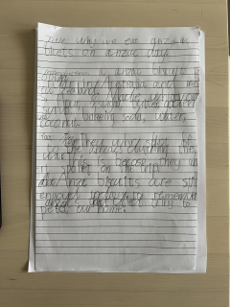 Full sheet of paper with child's handwritten text.