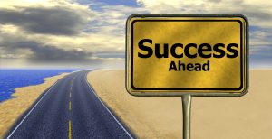 Road sign that says Success Ahead