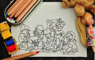Sketch of children's surrounded by coloured pens and dolls