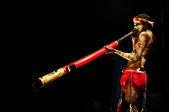 Aboriginal playing didgeridoo