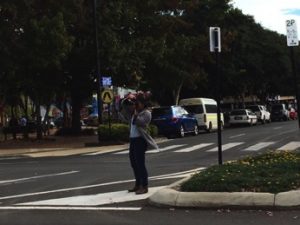 Man photographing street