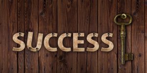 A decorative image with the word 'success' next to an antique key.